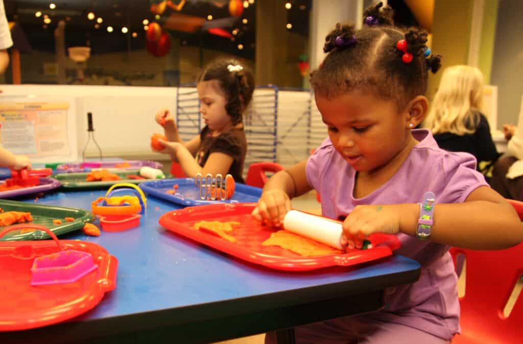 Children doing a hands on activity in OMSI's Discovery Lab.